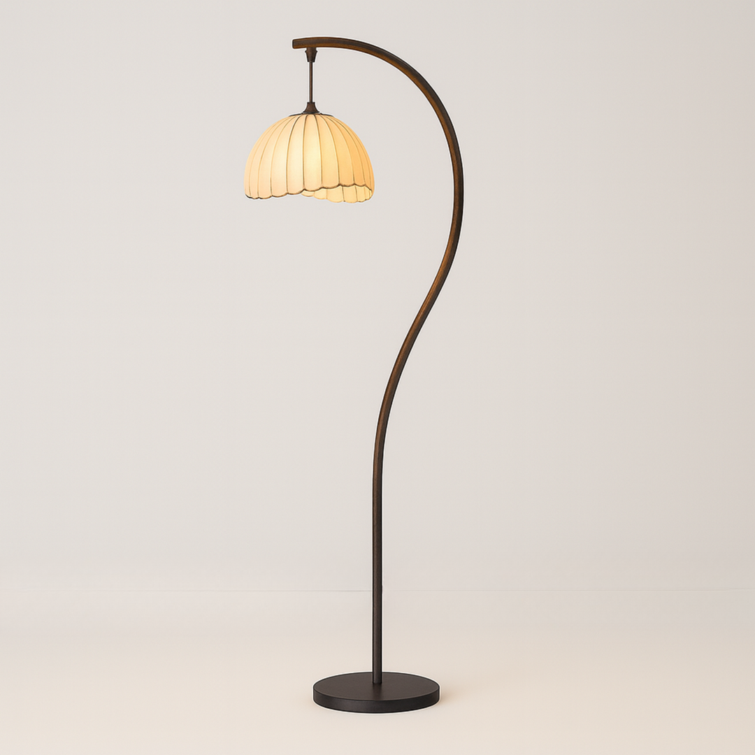 Arched bronze floor lamp with scalloped beige dome shade, 150 cm in height, shown against a plain background.