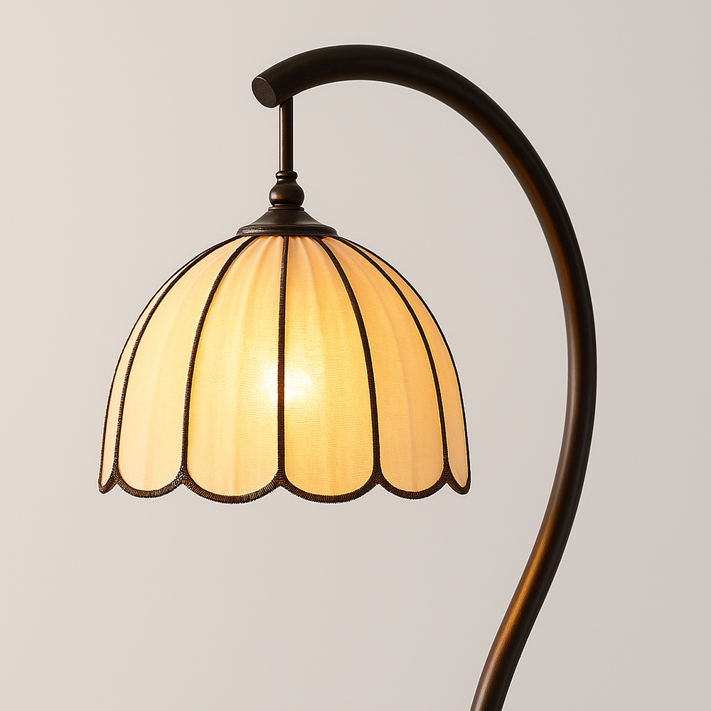 Arched bronze floor lamp with scalloped beige dome shade, 150 cm in height, shown against a plain background.