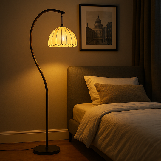 Arched bronze floor lamp with scalloped beige dome shade, 150 cm in height, shown against a plain background.