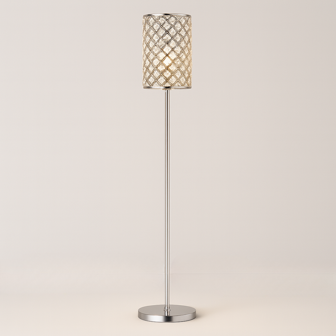Tall chrome floor lamp with crystal-patterned cylindrical shade, 160 cm in height, glowing warmly in a modern interior setting.