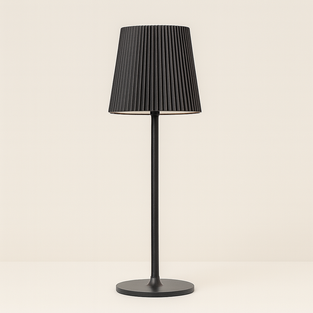 Slim black table lamp with pleated fabric shade and tall slender base, 35 cm in height, shown in a studio display with size dimensions.