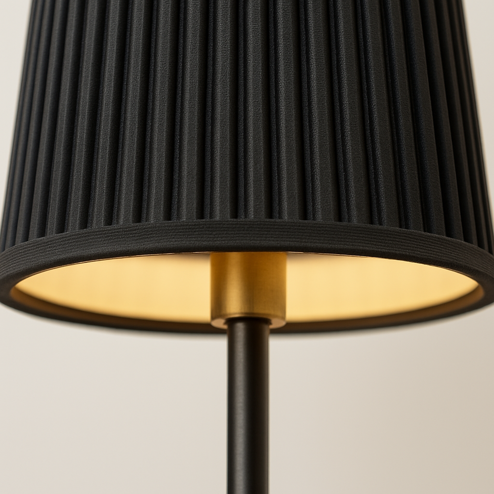 Slim black table lamp with pleated fabric shade and tall slender base, 35 cm in height, shown in a studio display with size dimensions.