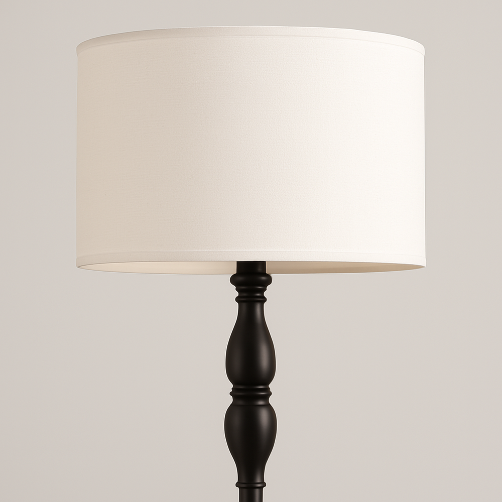 Tall black floor lamp with ivory fabric drum shade, 155 cm in height, displayed on a plain neutral background.