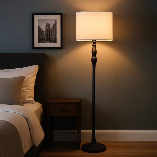 Tall black floor lamp with ivory fabric drum shade, 155 cm in height, displayed on a plain neutral background.