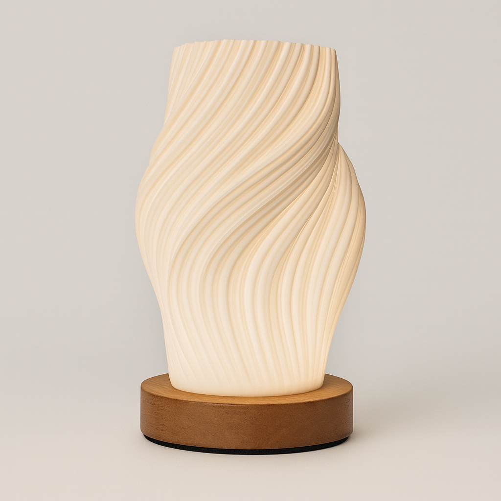 Wave-textured sculptural table lamp with warm LED glow and wooden base, measuring 21 cm tall, shown on a plain background.